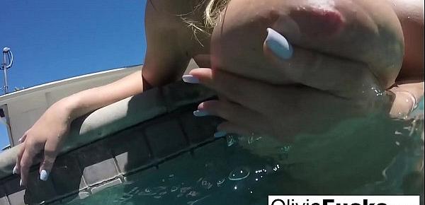  Horny Olivia plays with her pussy underwater